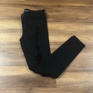 Women’s size 4, black, destructed Express skinny jeans